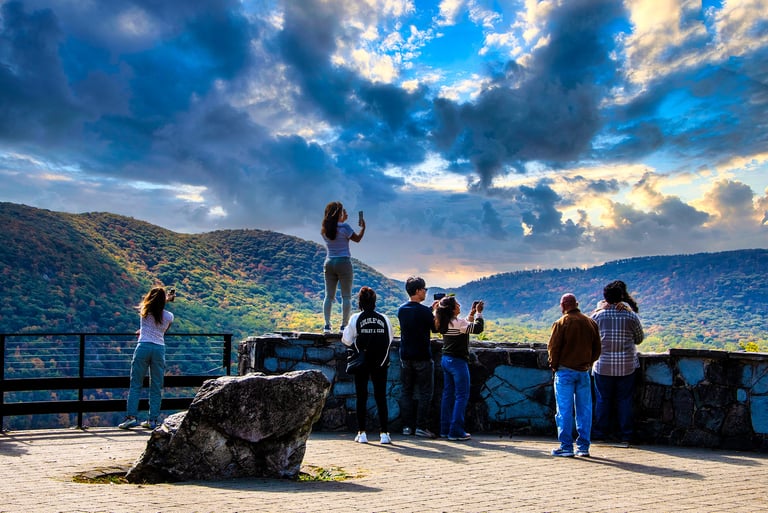 Photo of tourists at scenic overlook