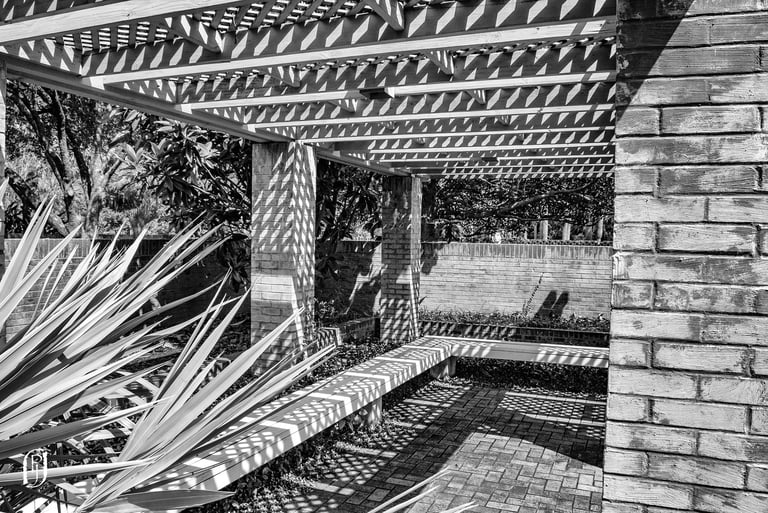 Photo of shadowed patterns in outdoor park
