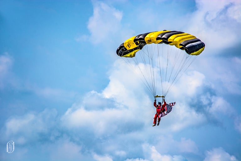 Photo of parachutist with American flag