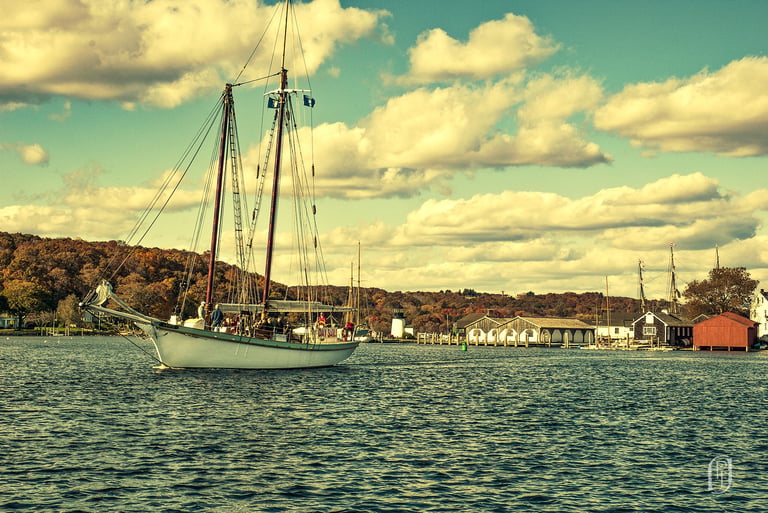 Photo of sailing ship leaving Mystic Seaport