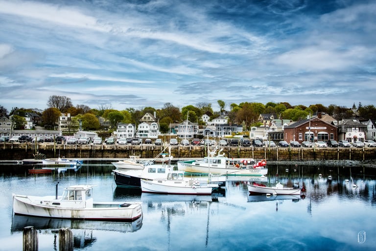 Photo of fishing boats in MA harbor