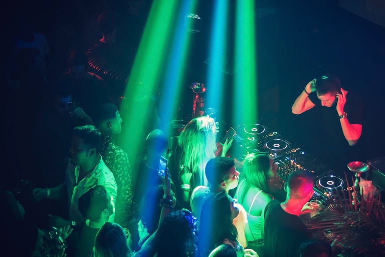 Professional DJ CUART performing a live technical set at a high-end venue in Marbella