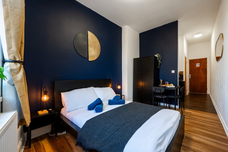 Double bed in a modern self-contained studio in Nottingham (NG7)