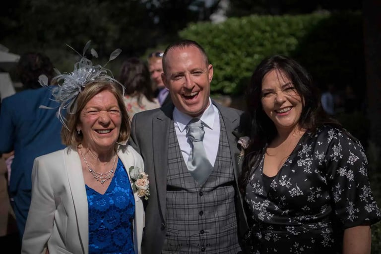Groom at his wedding with friends