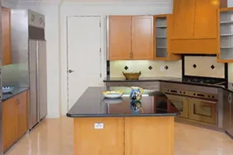 Custom stainless steel cabinets designed for modern residential interiors