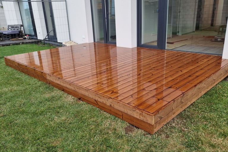 a wooden deck with a wooden decking area