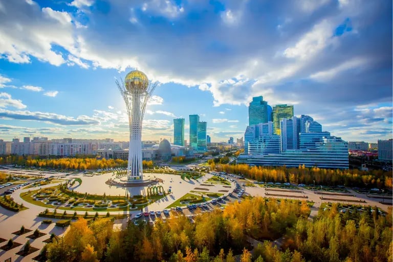Panoramic view of the Bayterek Tower and modern architecture in Astana, Kazakhstan city center.