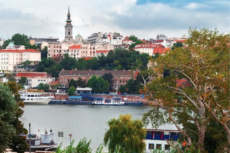 Panoramic view of Belgrade city skyline and the Sava river with boats in Serbia.