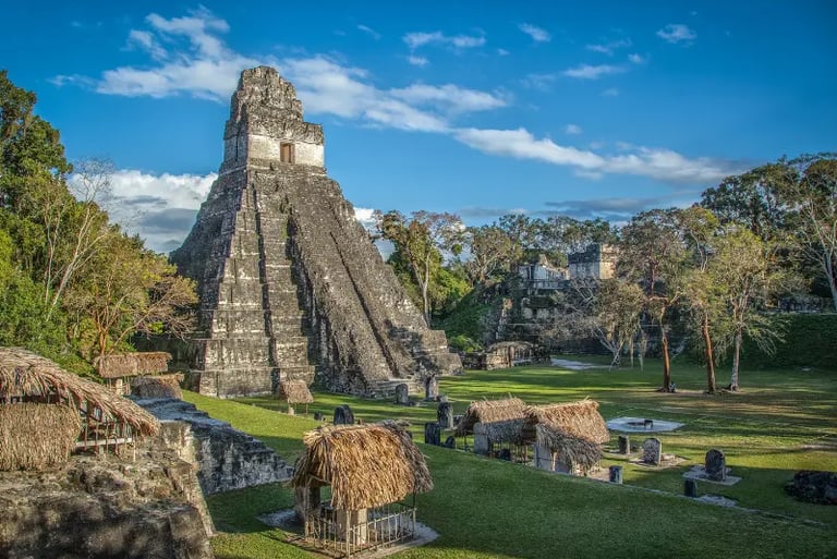 Ancient Mayan Tikal Temple I Rising Sun pyramid in the Guatemala jungle ruins.