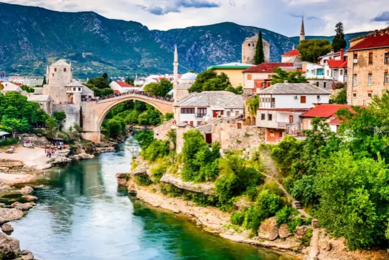 The historic Stari Most arched bridge over the Neretva River in Mostar, Bosnia and Herzegovina.