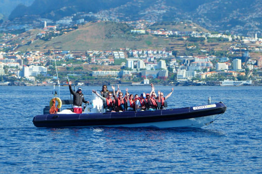 Speedboat tour in Funchal, Madeira with happy passengers.