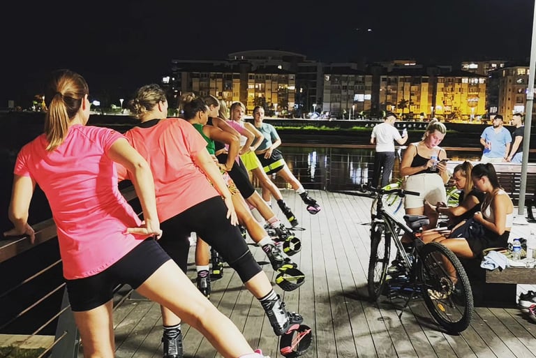 a group of people riding skateboards on a boardwalk