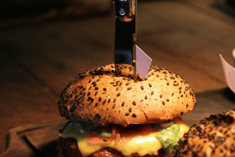 Photo by Michael Wave https://www.pexels.com/photo/close-up-shot-of-two-delicious-hamburgers-on-wooden-chopping-boards-430041
