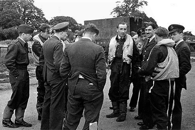 Flying Officer K J Wolinski and other 315 Squadron officers July 1941, RAF Northolt, after a sweep.