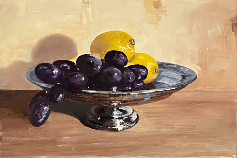 Still life oil painting of purple grapes and lemons in a silver bowl on a wooden table.
