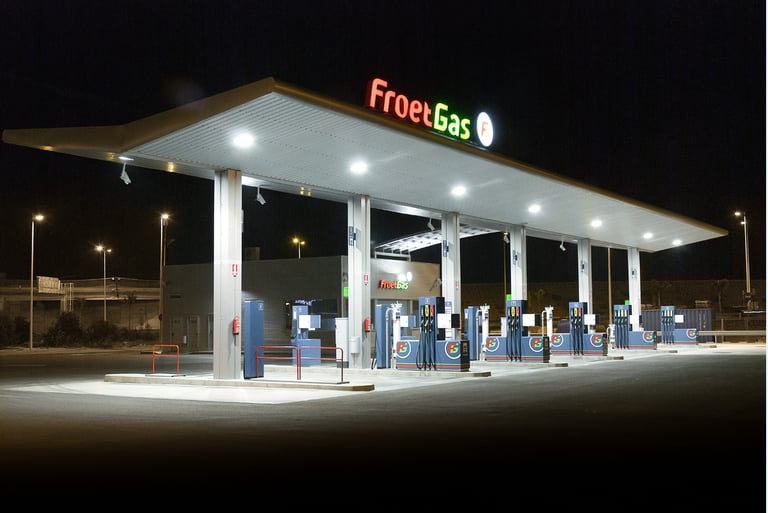 Gas station at night secured by AI fire detection, alert systems, and safety surveillance tools