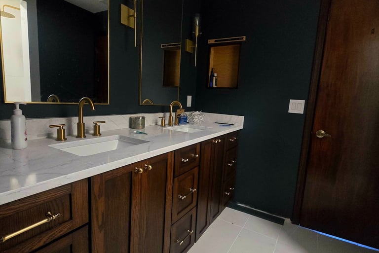 a bathroom with a double sink and a mirror