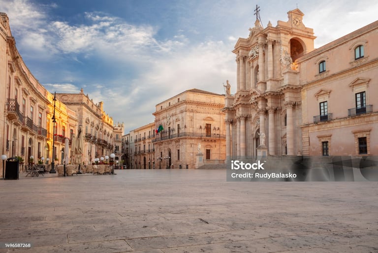 a large building with a clock tower in the middle of it