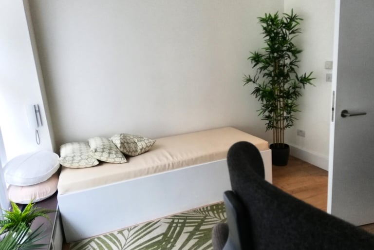 Therapy room with a couch.