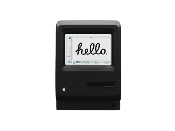 a vintage mac with the word hello on the screen