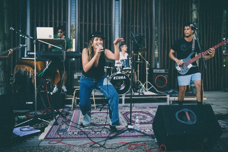Soulfultina singing with a full band