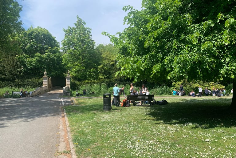 Visitors to the River Wey enjoying lunch by the river in Church Lane Upwey May 2026
