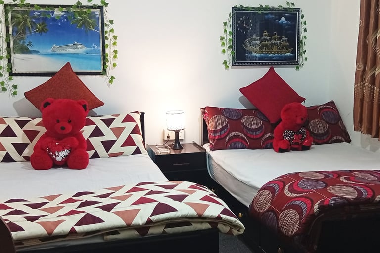 Double beds at Nobel Bungalow Nuwara Eliya – comfortable family room setup
