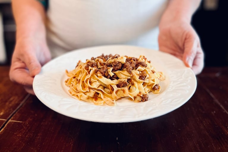 A plate of tagliatelle al ragù by Alessandra Spisni.