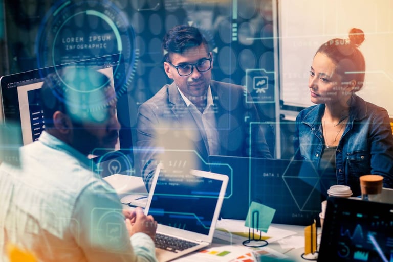 three persons discussing data with laptop