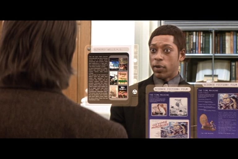 Scene from The Time Machine (2002) movie. AI library and human interacting