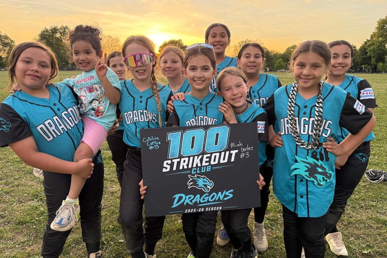 Photo of 9U team celebrating 100 Stirkeouts by pitcher Caroline