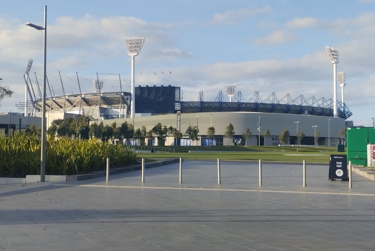 A wide-angle view of the Melbourne Cricket Ground (MCG) and the adjacent Kia Arena in Melbourne, Australia.