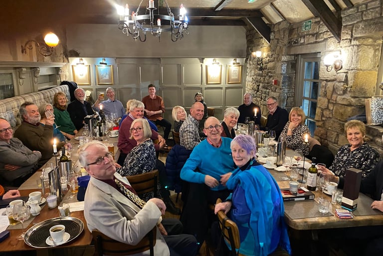 Voicemale members enjoying dinner