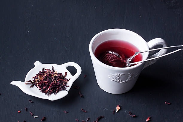 a cup of tea with a teapot and a teapot