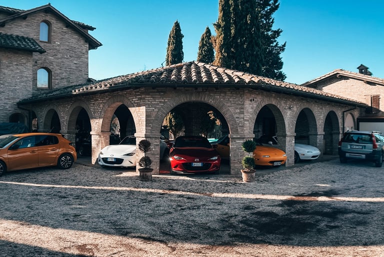 a group of cars parked in front of a building