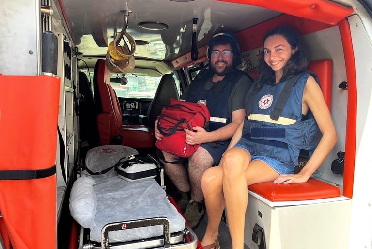 Oceane Maher and Seth Greenwald volunteering with Operation Manna and Magen David Adom