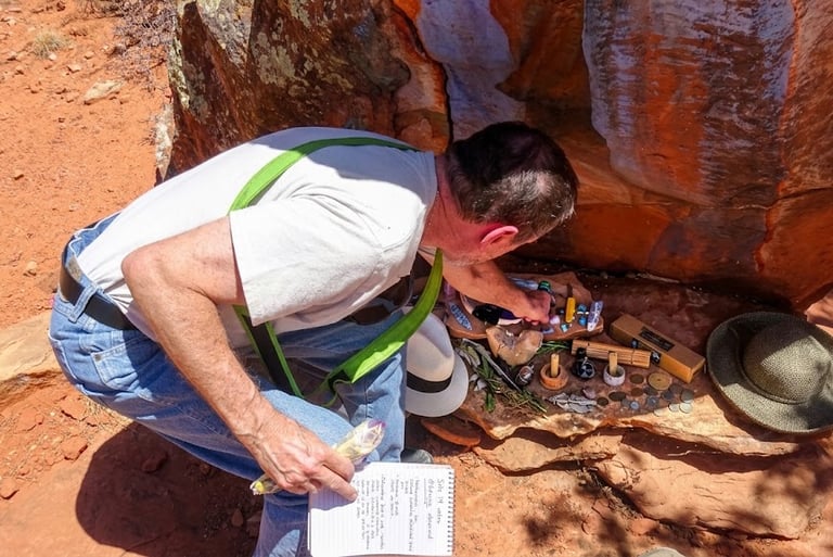 Jerry places our ceremony tools and offerings at the base of the medicine wheel's altar