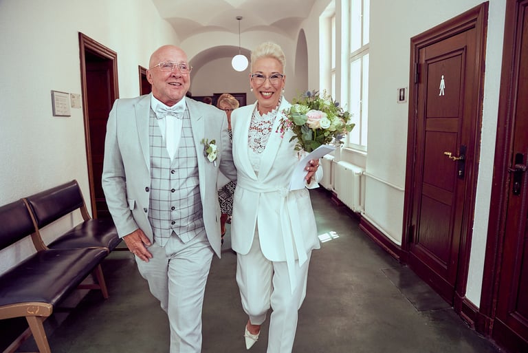 Bride and groom leaving the town hall after wedding.