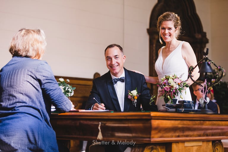 Bride and groom at the document signing.
