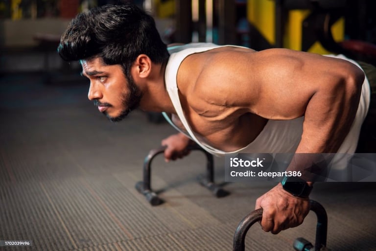 a man doing push ups with handles