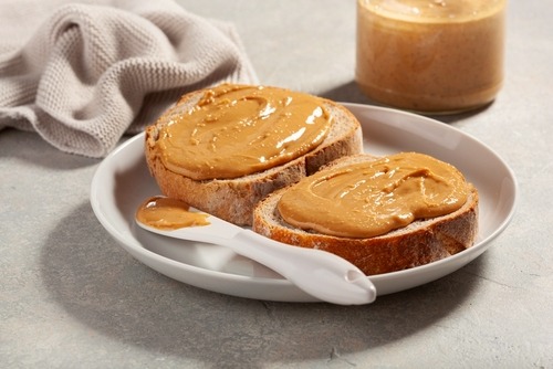a peanut butter spread sandwhich