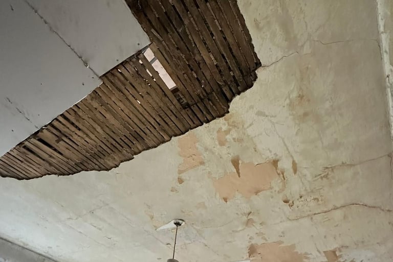 This wattle and daub ceiling needed completely overboarding.