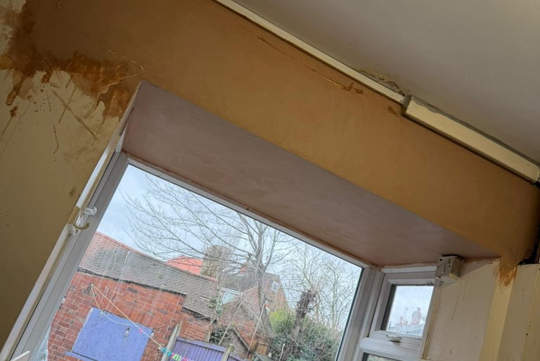 Then we skimmed the ceiling to give a smooth surface ready for redecoration.