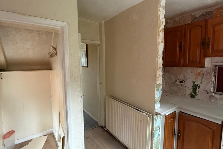 View of the kitchen as paper stripping began.