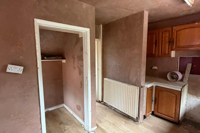Ceiling and walls skimmed in this traditional kitchen with walk in pantry.