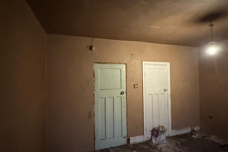Walls skimmed ready for new door architrives  and skirting boards to be fitted.