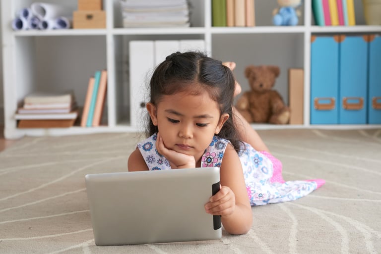 toddler using tablet