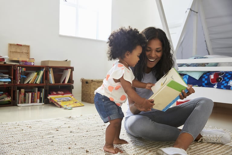mom reading to toddler