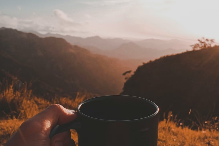 Coffee over a sunrise in the mountains time is money