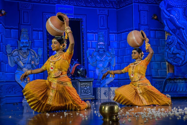 Two women performing a classical Indian dance in traditional attire captured by Memories and More Ph